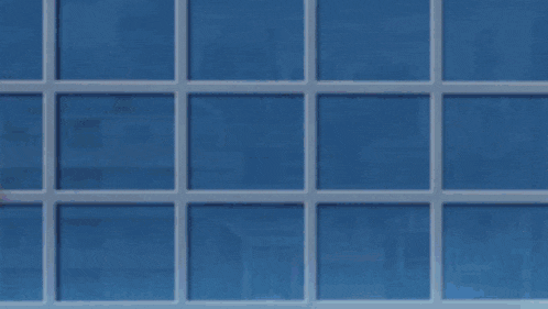 a person 's arm is shown in a cartoon with a blue tile background .