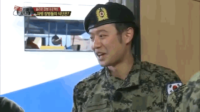 a man in a military uniform has a badge on his hat that says ' army ' on it