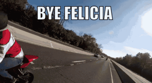 a person riding a motorcycle on a highway with the words bye felicia