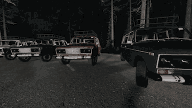 a car is parked on the side of the road with its doors open