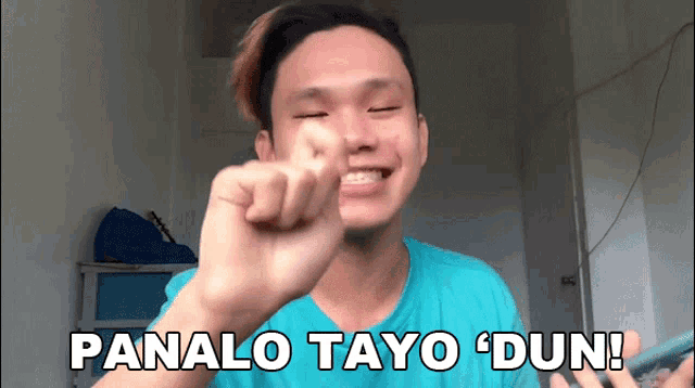 a man in a blue shirt says panalo tayo dun on the screen