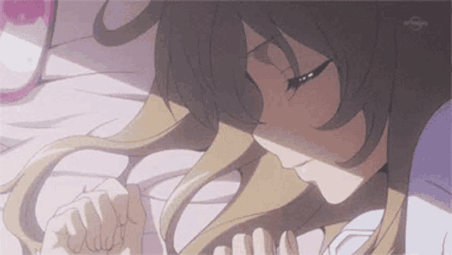 a girl is laying on a bed with her eyes closed and her hair is blowing in the wind .
