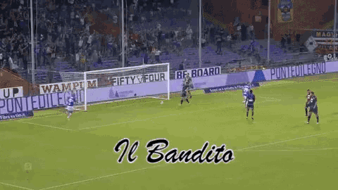 a soccer game is being played in front of a banner that says " il bandito "