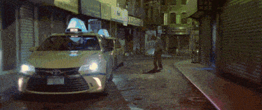 a yellow car with a license plate that says 9726