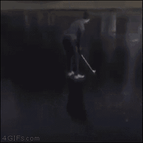 a black and white photo of a ghost in the dark