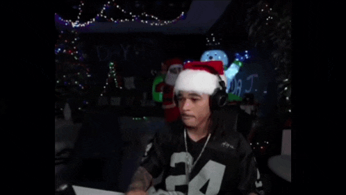 a man wearing a santa hat and a jersey with the number 21 on it