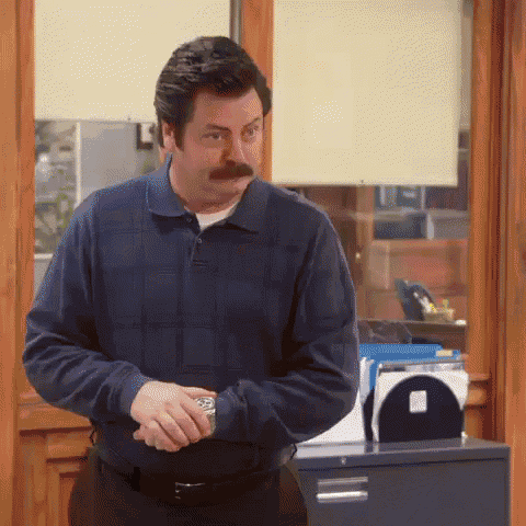 Ron Swanson Laughing GIF - Parksandrec GIFs