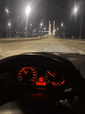 a car 's dashboard shows that it is currently driving at a speed of 220 mph