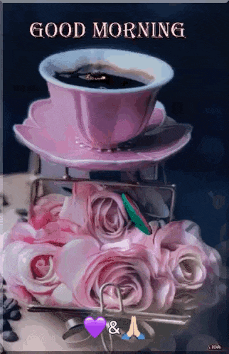 a cup of coffee is sitting on a saucer next to pink roses .