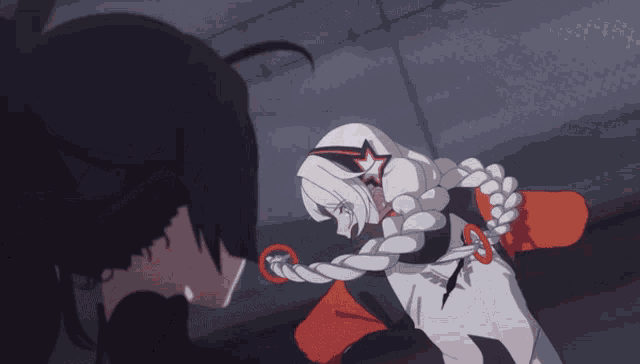 a girl with a star on her head stands next to a man
