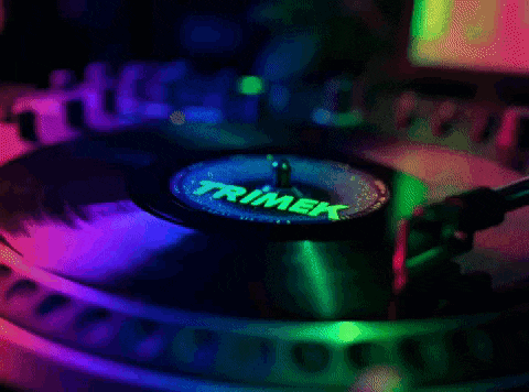 a trimek turntable with a record spinning on it