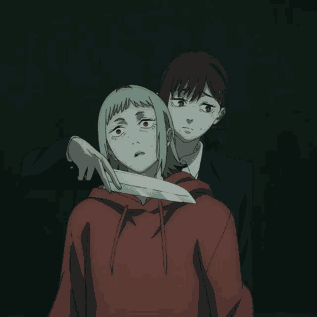 a girl in a red hoodie is holding a knife behind her back