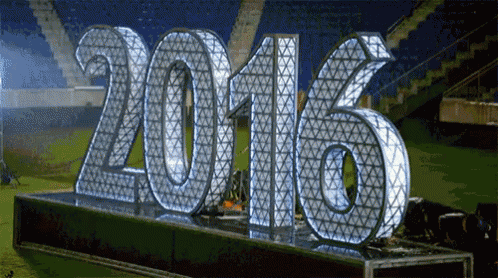 the year 2016 is displayed on a stage in a stadium