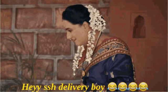 a woman in a blue saree is standing in front of a brick wall with the caption hey ssh delivery boy