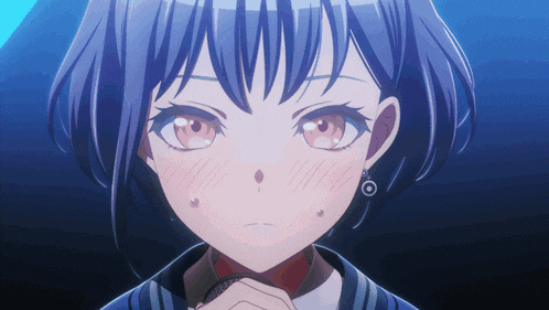 a close up of a girl with blue hair
