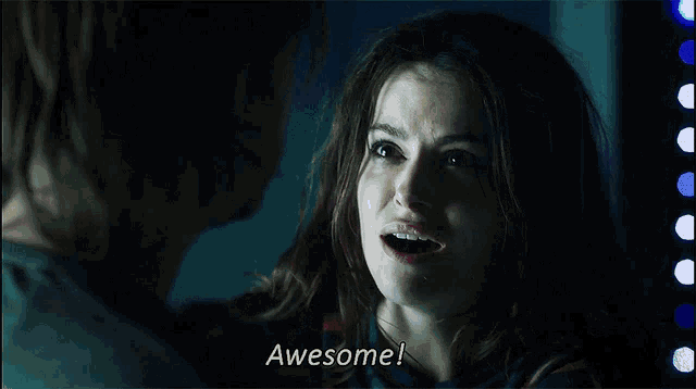 a woman is talking to a man and the words awesome are above her
