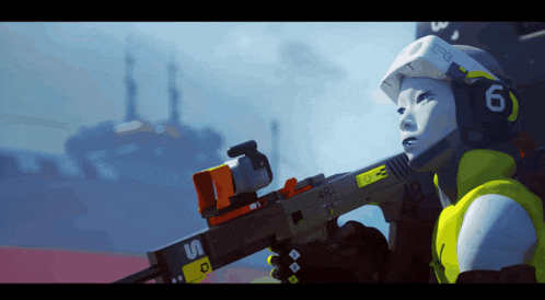 a person holding a gun with the number 6 on it