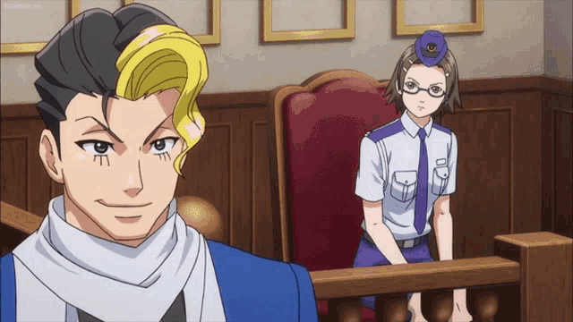 a man and a woman are in a courtroom and the man is wearing a blue tie with the letter o on it