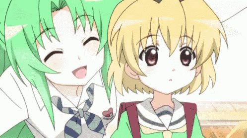two anime girls are smiling and looking at the camera