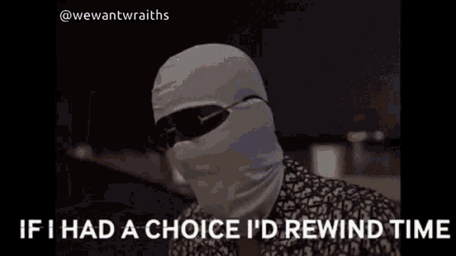 a person wearing a ski mask and sunglasses says if i had a choice i 'd rewind time