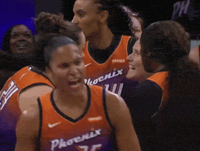 a group of female basketball players are wearing phoenix uniforms