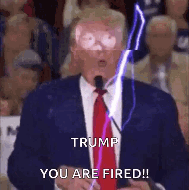 a man in a suit and tie is giving a speech and says trump you are fired .