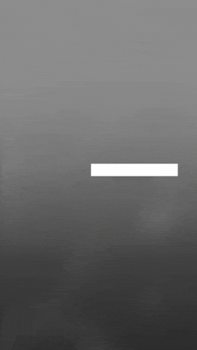 a white line on a gray background with a gray sky in the background .