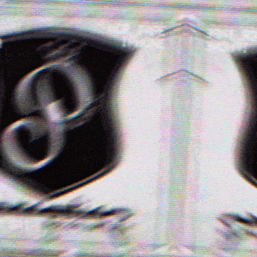 a blurred image of a sign that says ' ncr ' on it