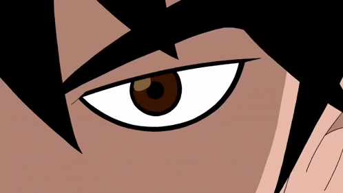 a close up of a brown eye with a white pupil