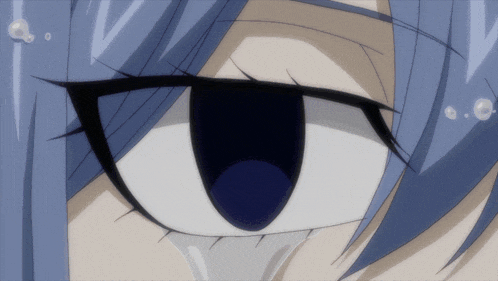 a close up of a person 's eye with a blue pupil