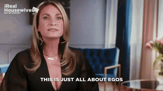 a woman says " this is just all about egos " in front of a real housewives logo