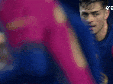 a close up of a soccer player 's face with the number 45 on the bottom