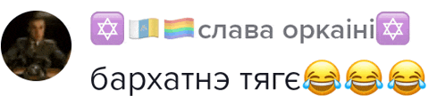 a blurred image of a man with a purple star and a rainbow flag