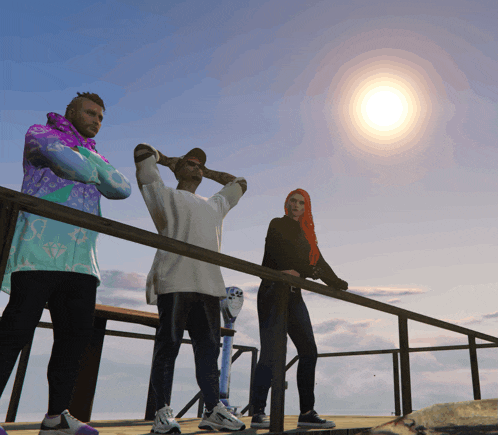 a group of people standing on a railing looking at the sun