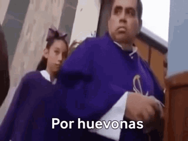 a man in a purple robe is standing next to a girl in a purple dress and says `` por huevonas '' .