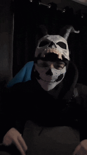 a blurry picture of a person in a mask