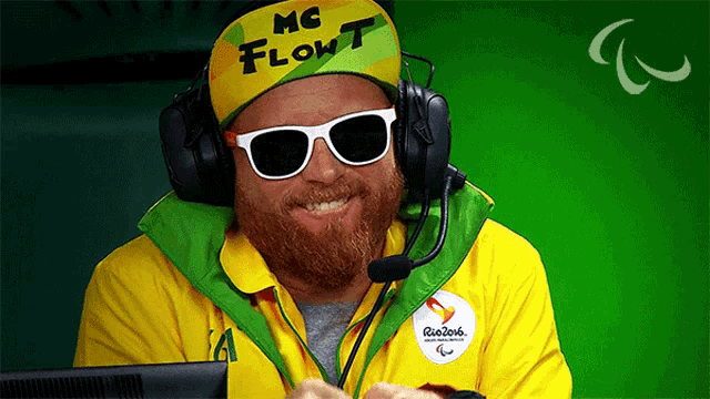 a man wearing headphones and a hat that says mc flow t