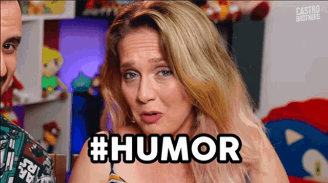 a woman is making a funny face and the word humor is next to her