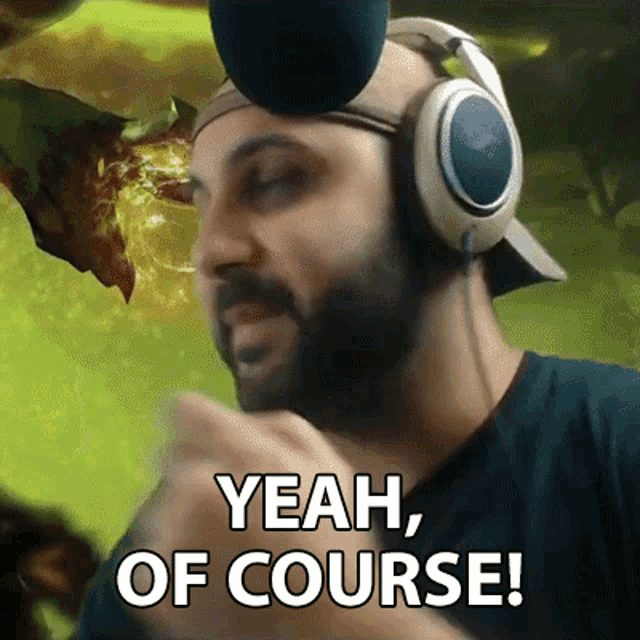 a man wearing headphones and a hat says " yeah of course "
