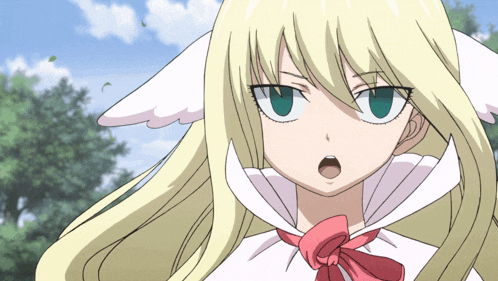 a girl with blonde hair and green eyes is wearing a red bow
