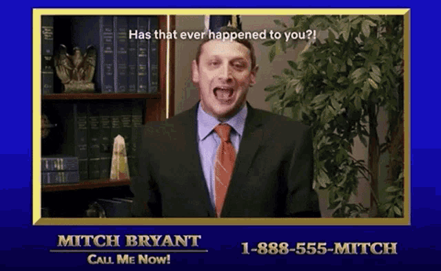a man in a suit and tie stands in front of a bookshelf and says has that ever happened to you