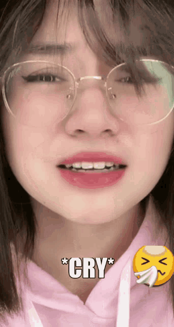 a close up of a woman 's face with the words " cry " written on it