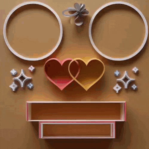 a couple of hearts are sitting on top of each other on a wall surrounded by circles .