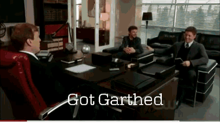 a group of men sitting around a table with the words got garthed written on the bottom