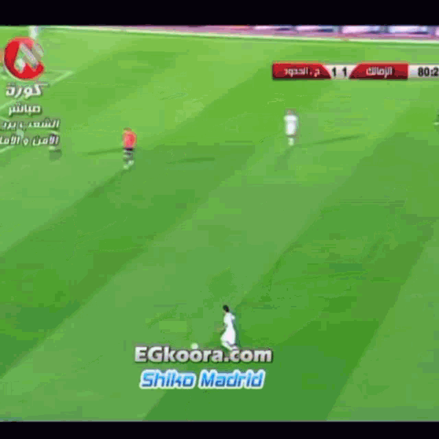 a soccer game is being shown on a tv screen