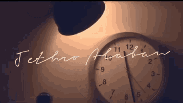 a clock with the name jethro alaban written below it