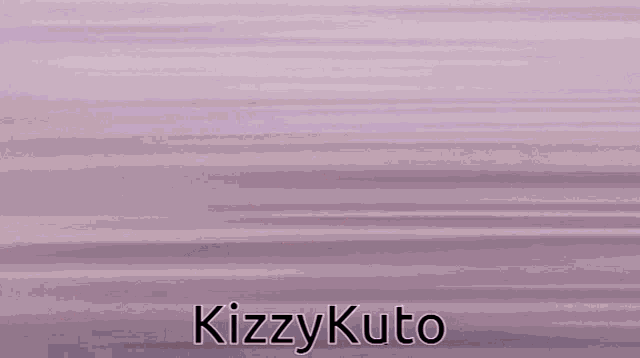 a close up of a person 's foot with the words kizzykuto written on it