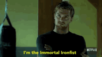 a man in a black shirt says i 'm the immortal iron fist