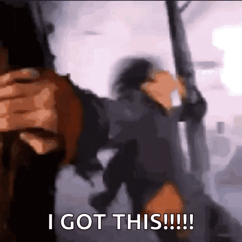 a blurry picture of a person holding a gun and the words `` i got this ''