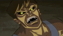 a cartoon character with yellow eyes and sharp teeth is looking at the camera .
